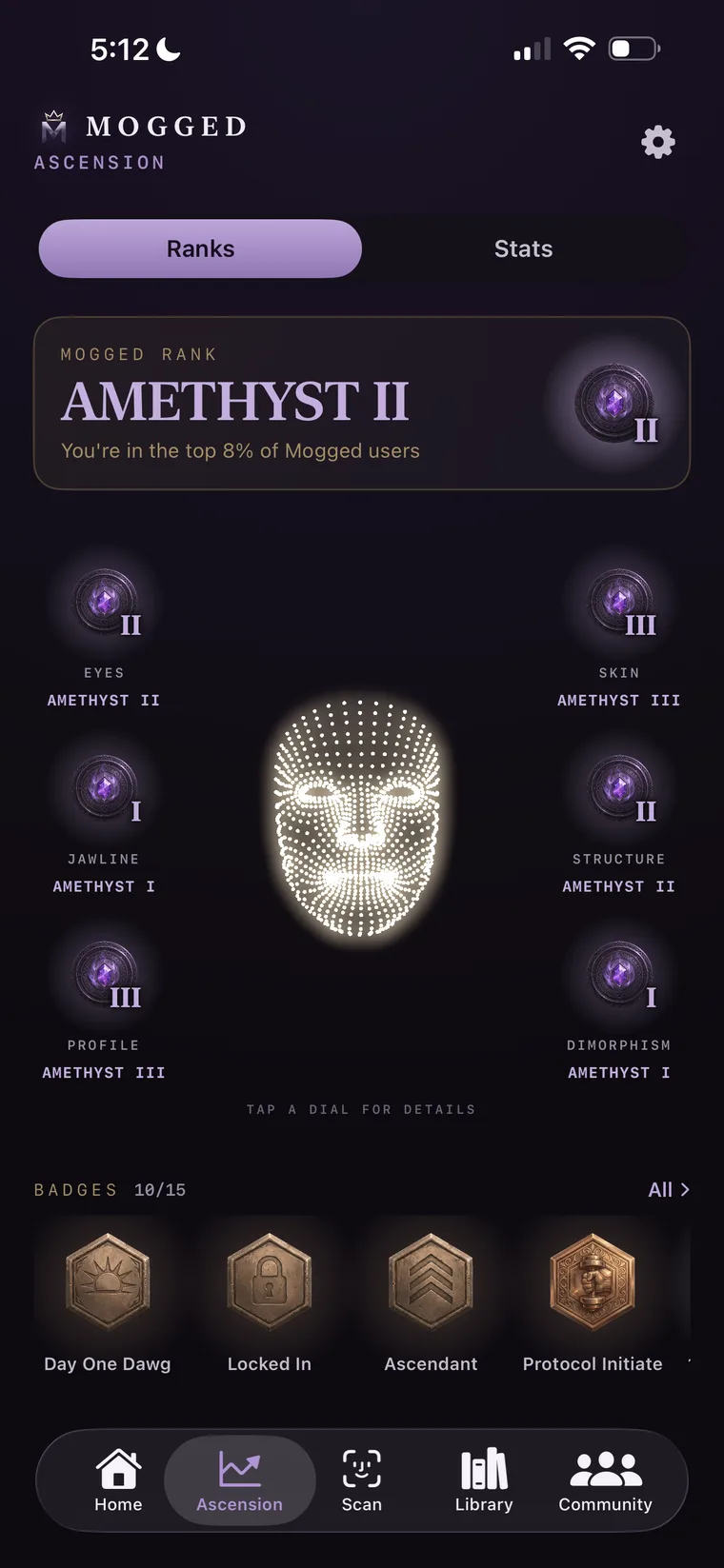 Écran Ascension de Mogged affichant les rangs de traits et les badges de réussite